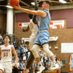Hunter Moen jumps around Terrace’s Jeffrey Anyimah for two points Terrace