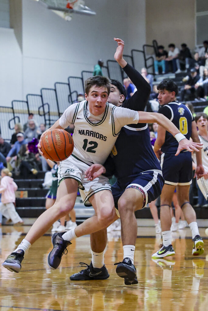 Prep boys basketball: Warriors double down on defense in District