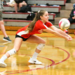 Isabel Ong digging the ball