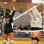 Kierra Scott floating the ball over Cedarcrest’s defenders to tie the 3rd game up 27-27