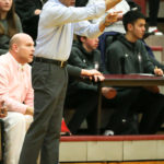 Coach Sood directing his team on how to run an inbound play