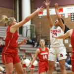Lindsey Ho getting a quick jumper over Snohomish’s Kaylin Beckman