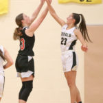 Cameron Dunn blocking Lynnwood’s Katelyn Kesinger’s shot
