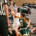 Kaiya Beavin shooting over MG’s Faith Sherman