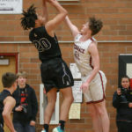 One of Jace Breakfield’s four blocks, this one on Arlington’s 6’10” Will Abram