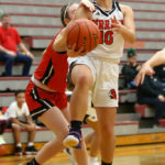Lindsey Ho is fouled by Marysville-Pilchuck’s Emily Hamre for a three point play