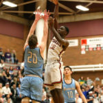 Muhammed Kinteh gets a shot off over Meadowdale’s Cole Nelson