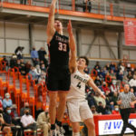 Adison Mattix beating Arlington’s Grayson Falk to the hoop