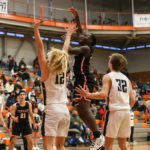 Jeffrey Anyimah with a pull up jumpshot over Arlington’s Trent Nobach