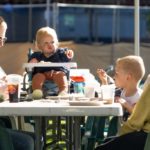 A family enjoying the Tour de Terrace pancake breakfast, 7-23-23