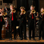 3 – MTHS Jazz 1 trombonists perform during The Sunny Side of the Street