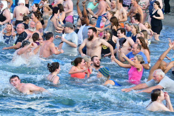 Hundreds welcome 2023 in Edmonds with New Year's Day dip - My