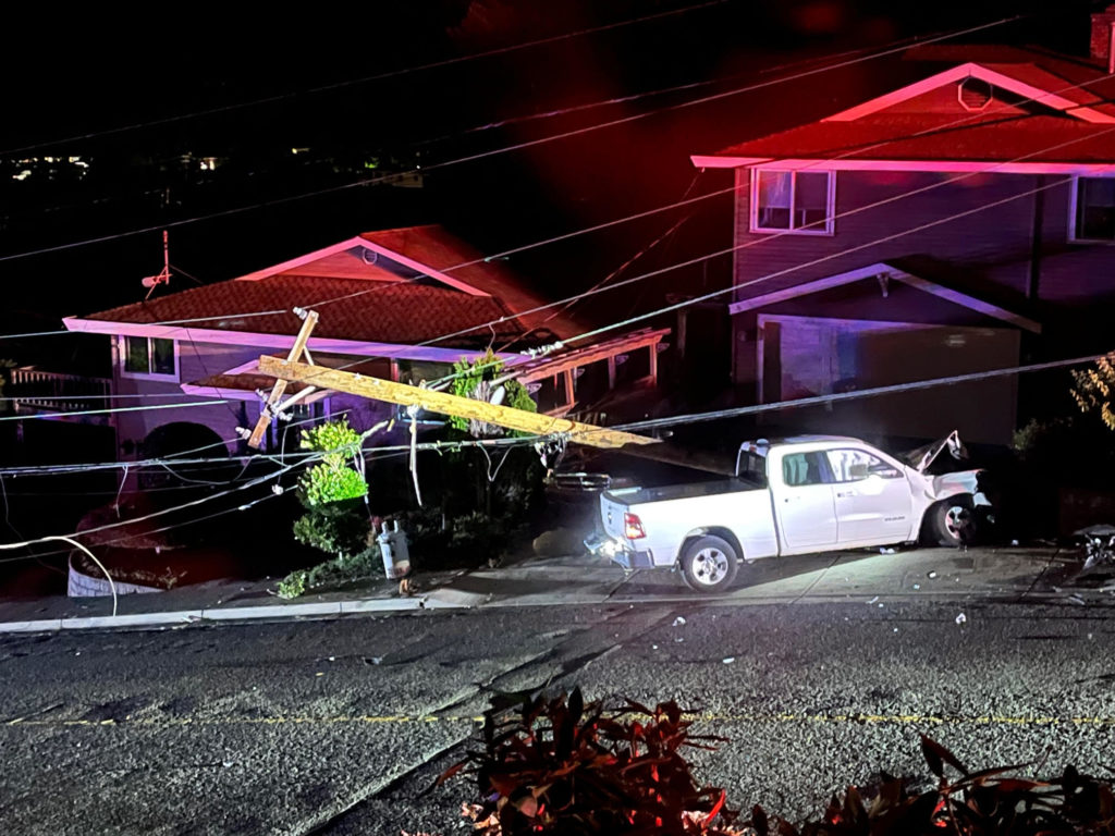 Truck crashes into power pole, causing outage; driver arrested for DUI ...