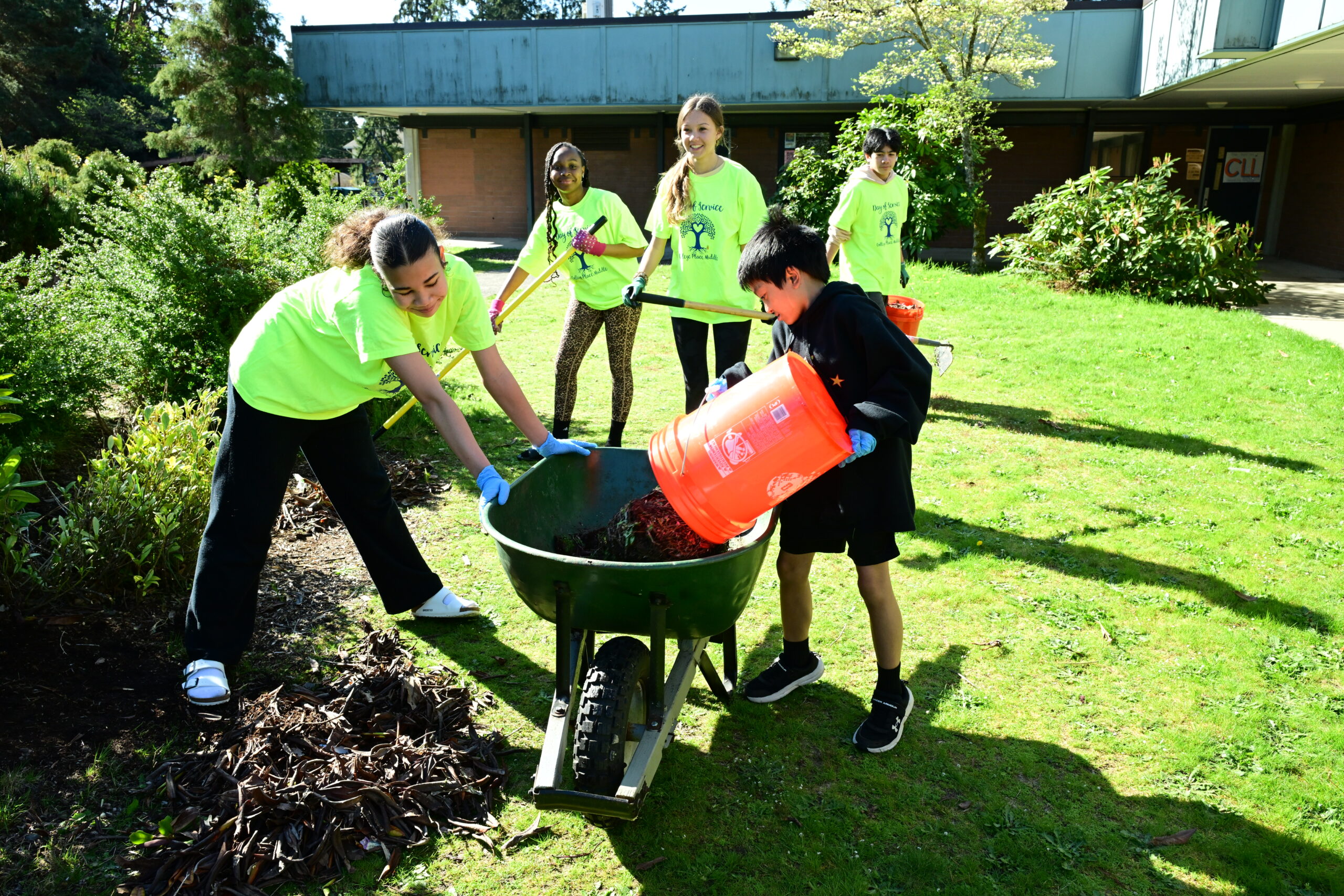 Students, parents and staff pitch for Earth Day cleanup at College Place Middle